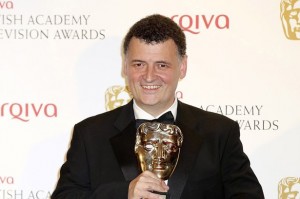 Winner of the Special Award, Steven Moffat poses in front of the winners boards